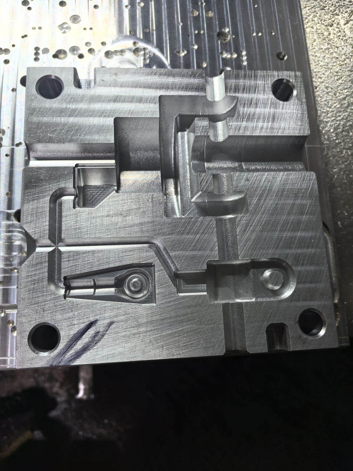 Aluminum plate with four machined mold cavities